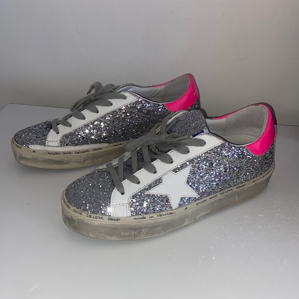 Real Golden Goose sneakers, pink, silver, and white.